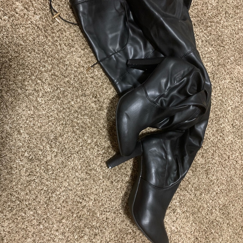 Black, Kees high, high heel and plus size boots.